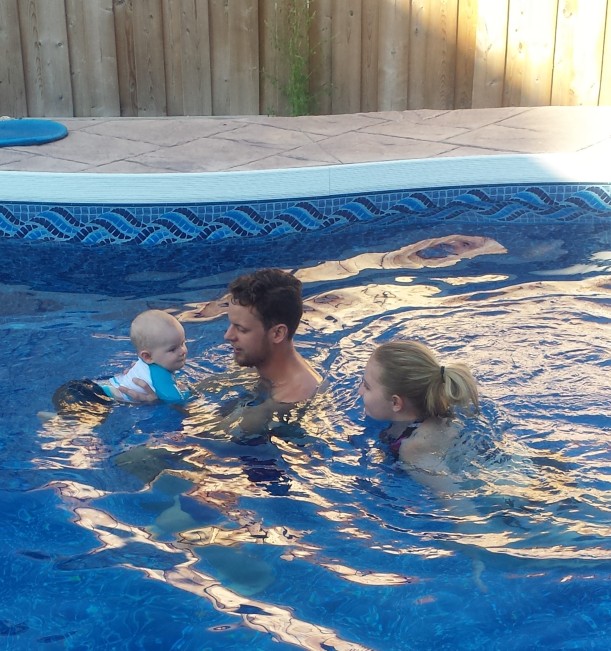 Enjoying an afternoon of fun in the pool with Carly and Nathan.